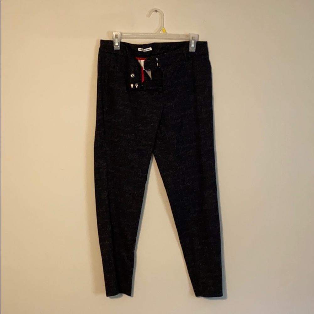 Black-grey print trousers.